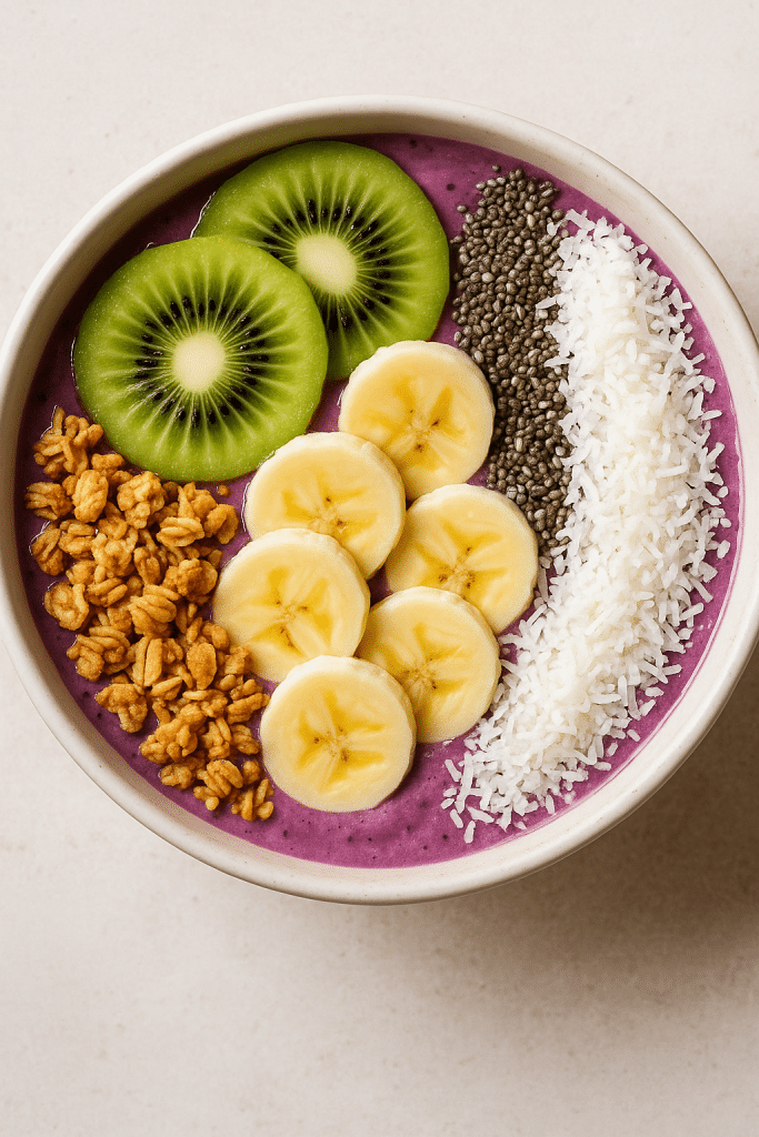 15 Best Healthy Smoothie Recipes Women Will Love 6 Colorful smoothie bowl with fruit toppings granola and seeds from healthy smoothie recipes